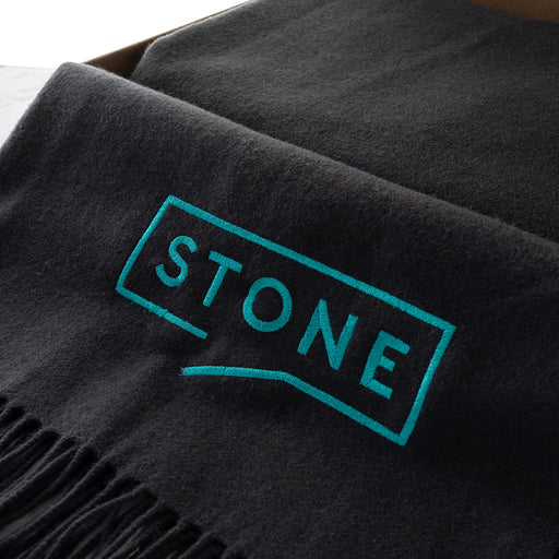 Close-up of soft merino wool texture and detailed custom stitching