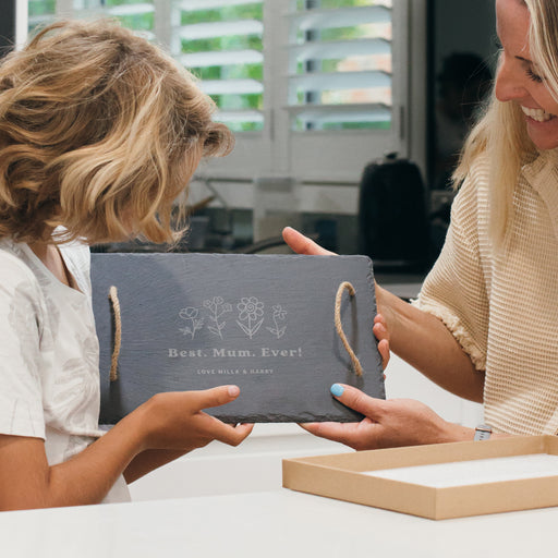 Custom laser-engraved Mother’s Day slate cheese board with rustic handles, ideal for any mother figure