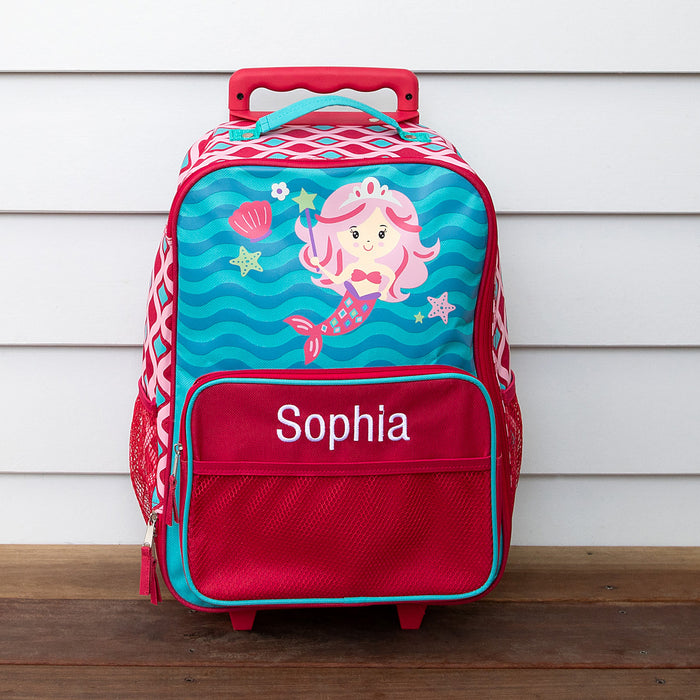 Personalised trolley case with embroidered child's name on the front pocket and mermaid design.