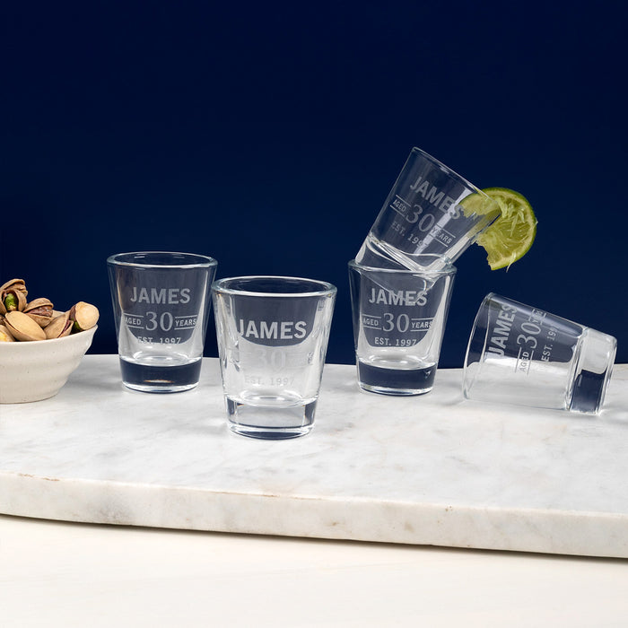 Personalised 50ml shot glass with engraved 30th birthday design, name, and date.