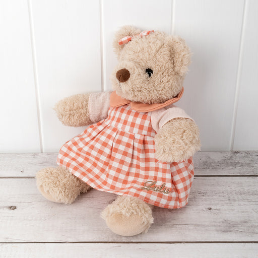 Custom teddy bear named Ella wearing a personalised dress, ideal keepsake gift for baby girls and special milestones