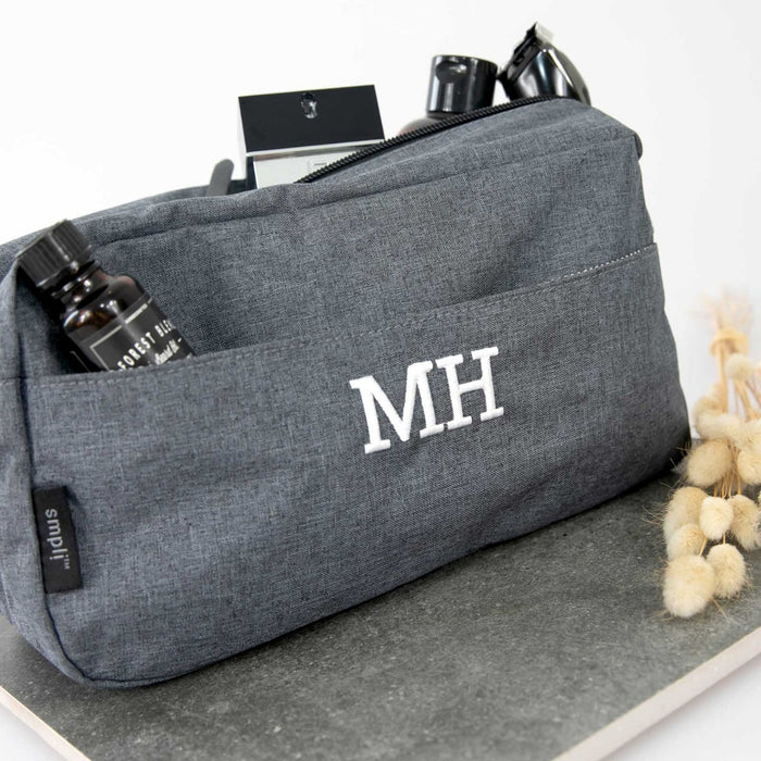 Personalised grey toiletries bag with embroidered initials