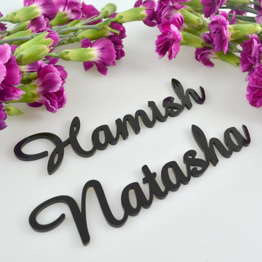 Laser cut acrylic place cards with guest names
