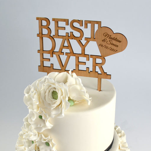 Natural wood Best Day Ever wedding cake topper engraved with bride and groom’s names and date