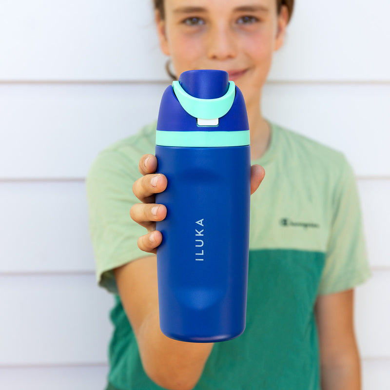 Personalised 480ml stainless steel kids water bottle engraved with a child's name and leak-resistant straw lid.