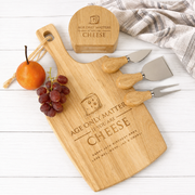 Engraved wooden paddle serving board with matching cheese knife block set
