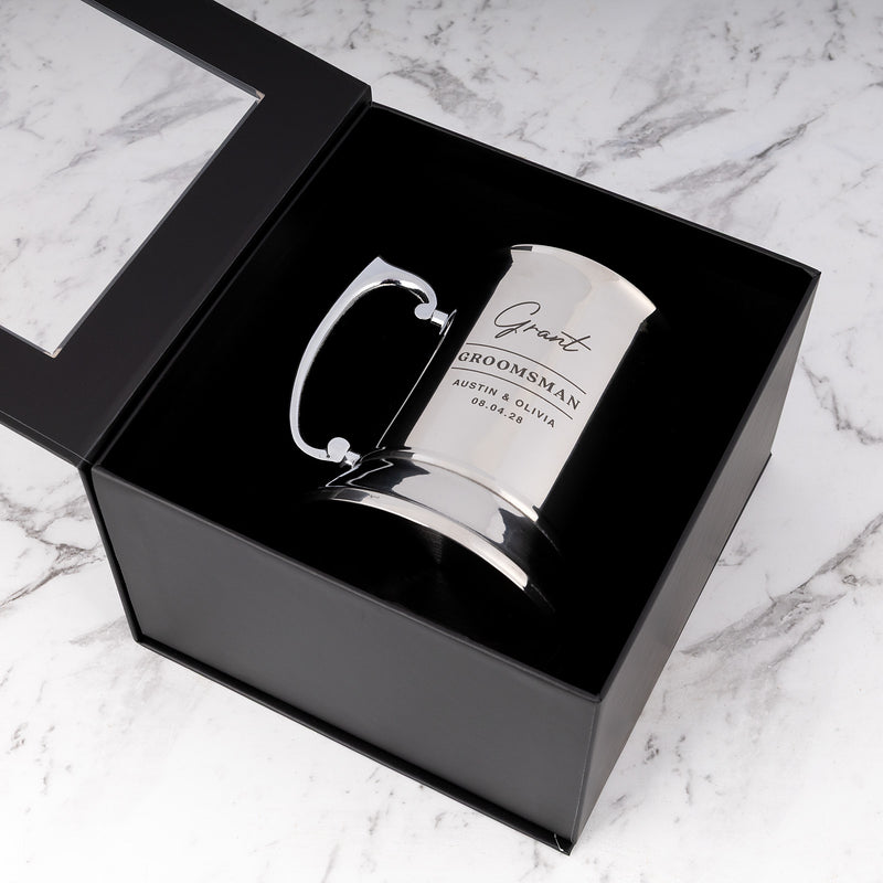 Personalised stainless steel wedding beer mug presented in a black gift box.
