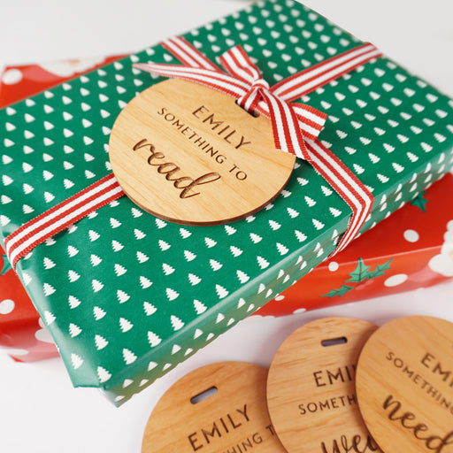 Personalised wooden Christmas gift tags with engraved gifting prompts