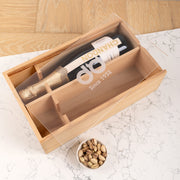 Custom engraved wooden twin wine box with clear acrylic lid, holding two bottles of wine.