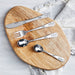 Personalised silver bear cutlery set for children with engraved name on each utensil.