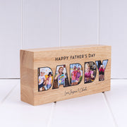 ersonalised wooden photo block featuring five family photos inside the word DADDY with a Happy Father's Day message.