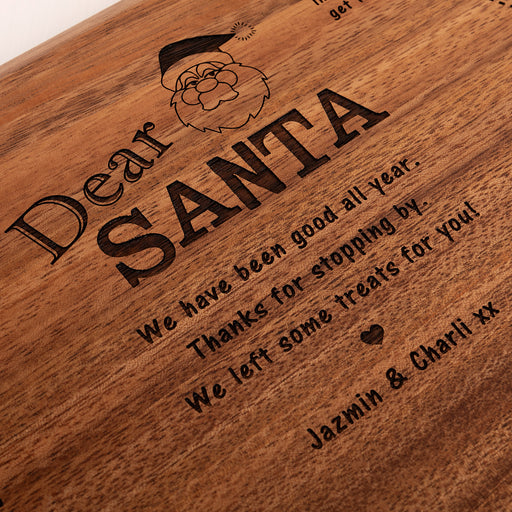 Custom Christmas Eve board with child’s name and thank you message, perfect for Santa’s snacks