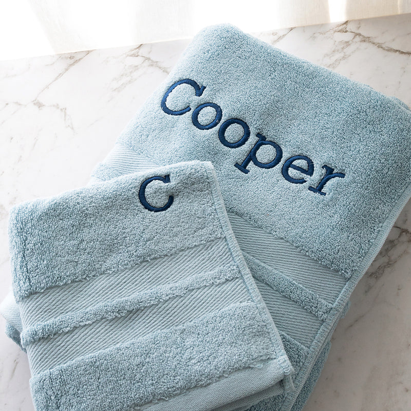 Custom light blue cotton bath and hand towel set, soft and absorbent with name and initial embroidery