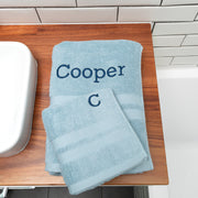Light blue towel set made from 100% cotton, personalised with choice of font and thread colour for a unique gift