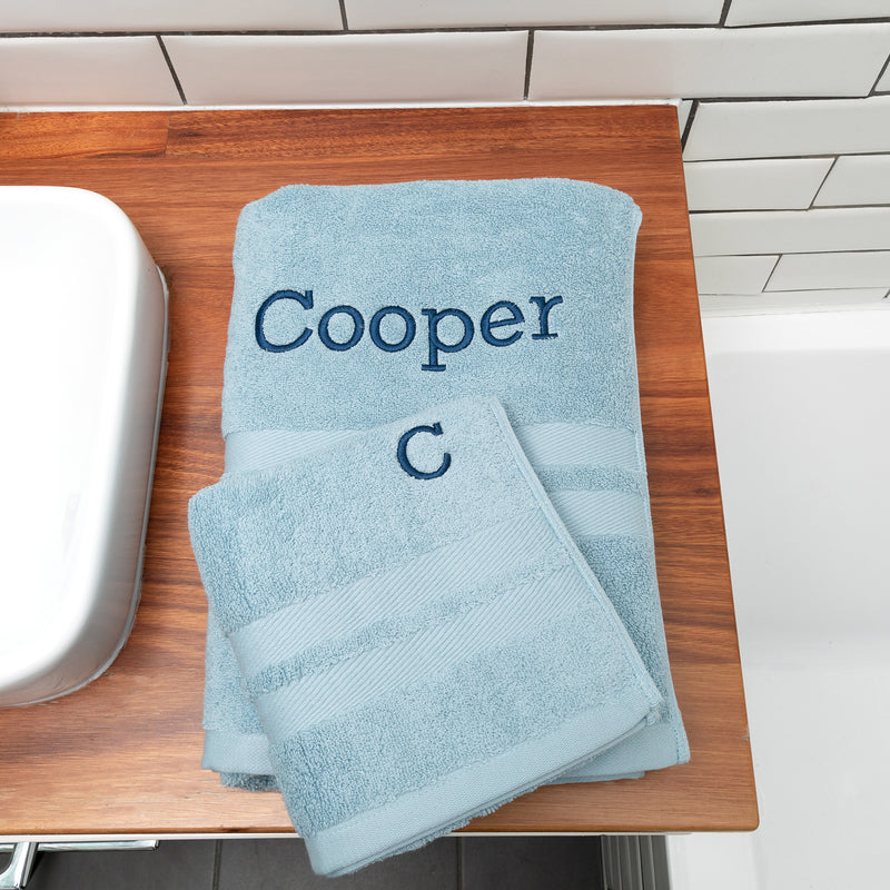 Light blue towel set made from 100% cotton, personalised with choice of font and thread colour for a unique gift
