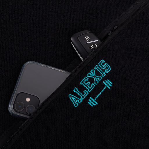Custom black gym towel with initials and storage pouch