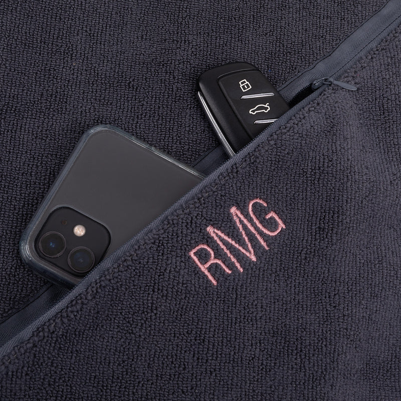 Charcoal gym towel with custom initials embroidery and storage pocket