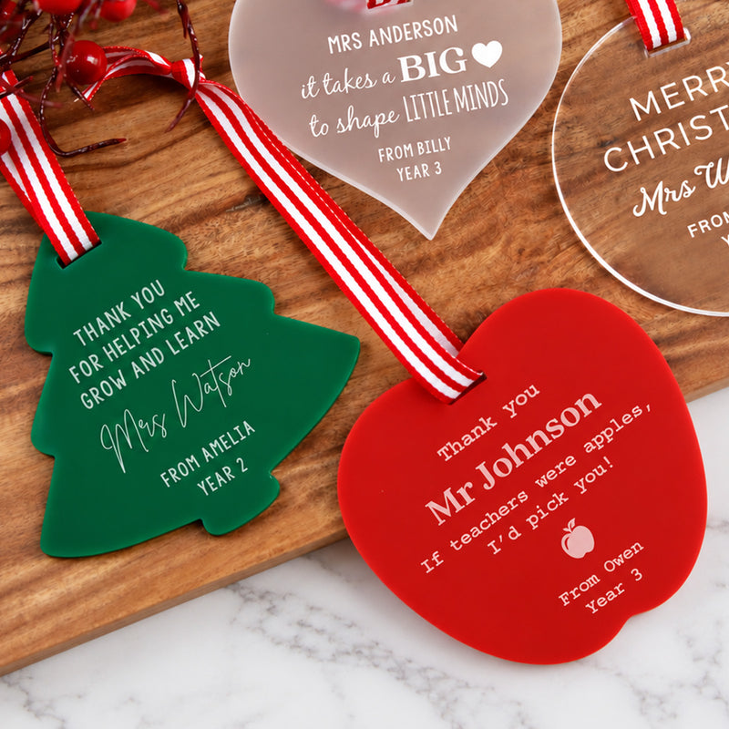 Personalised teacher Christmas gifts in heart, bauble, Christmas tree and apple acrylic designs.