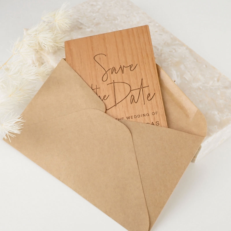 Custom designed engraved wooden save the dates