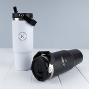 Custom engraved insulated stainless steel tumbler with flip straw, folding handle and 900ml capacity.
