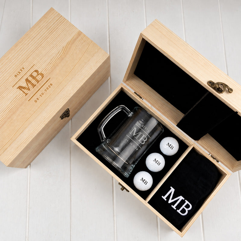 Wooden boxed golf gift set with personalised 500ml beer mug, three printed golf balls and embroidered golf towel for milestone birthdays.