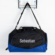 Blue personalised duffle bag with embroidered name – ideal for sporty kids at Christmas