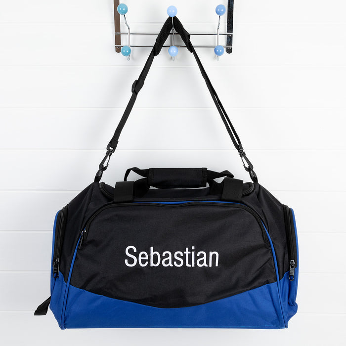 Blue personalised duffle bag with embroidered name – ideal for sporty kids at Christmas