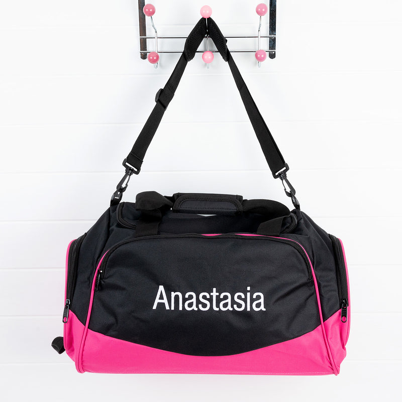 Personalised pink duffle bag for kids with name embroidered on front – great Christmas gift