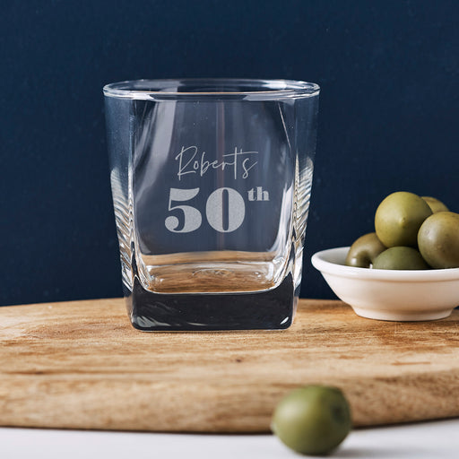 Unique 50th birthday gift – personalised whiskey glass, laser engraved with name and date for a memorable milestone celebration.