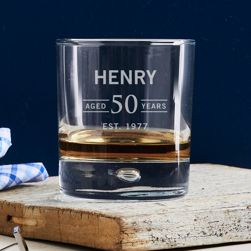 Laser engraved personalised 50th birthday whiskey glass – the perfect unique birthday gift for whiskey, bourbon, and scotch lovers.