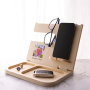 Personalised wooden accessories holder printed with a family photo, designed to organise a phone, watch, keys, wallet and glasses.