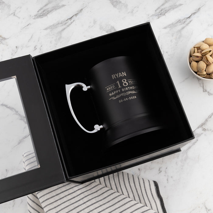 Personalised black metal beer mug with milestone birthday design presented in a premium black gift box