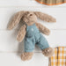 Personalised taupe bunny rabbit wearing dusty blue embroidered overalls with a child’s name, a perfect gift for newborns, Easter, or birthdays.