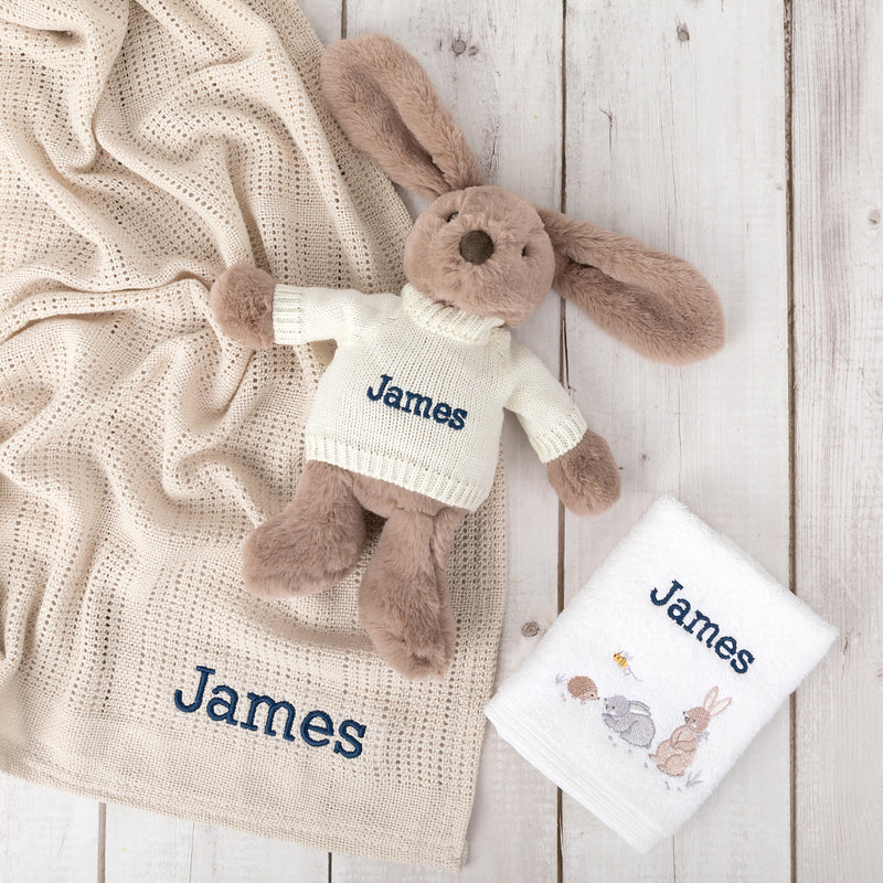 Cotton baby blanket and embroidered face washer with bunny design