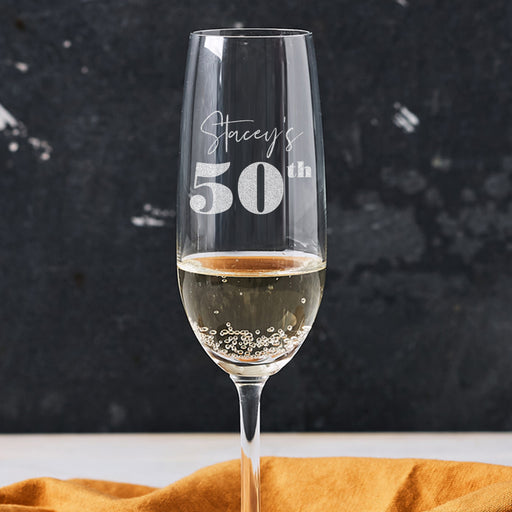 Custom laser engraved 50th birthday champagne glass – personalised birthday gift idea for celebrating 50 years. 