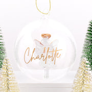 Glass ornament with delicate angel and gold hanging loop, ideal for meaningful gifting
