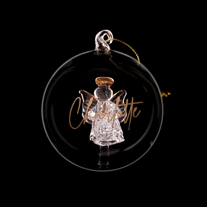 Decorative angel ornament with 'Charlotte' text on a black background