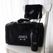 Personalised gym hamper with embroidered sports bag, engraved protein shaker and matching microfibre gym towel with name or initials.
