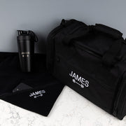 Custom fitness gift set including a personalised gym bag, 750ml protein shaker and embroidered microfibre towel for gym lovers.