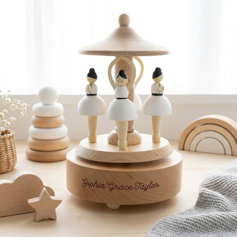 Personalised beech wood musical ballerina carousel for nursery décor with rotating ballerinas and custom engraving