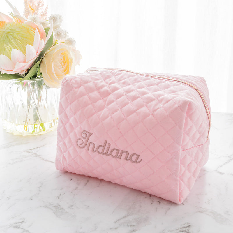 Personalised pink quilted makeup bag with gold zip and embroidered name in rose gold
