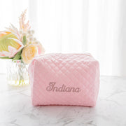 Embroidered name makeup bag with wipe-clean lining, stylish and practical travel accessory