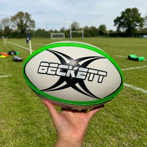 White and green Gilbert rugby ball personalised with name in black