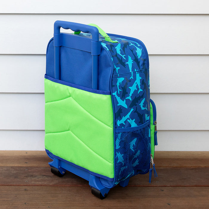 Back view of kids shark trolley case showing handle, wheels and green padded panel.