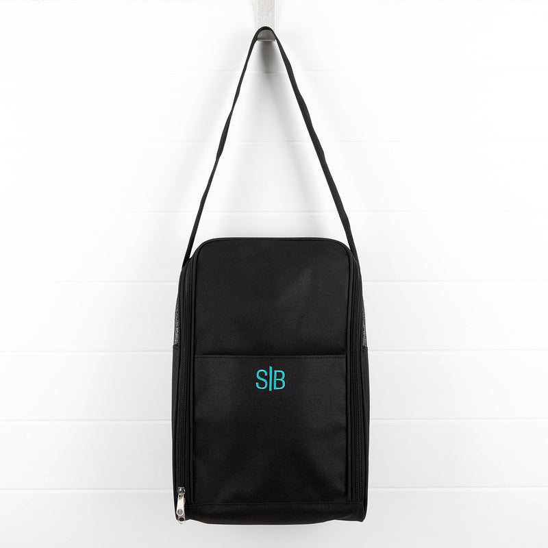 Black personalised shoe bag with teal embroidered initials and shoulder strap