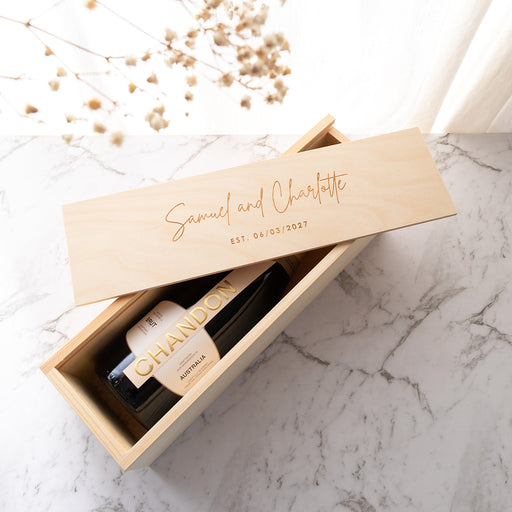 Engraved wooden gift box with couple’s names and wedding date, perfect for milestone celebrations