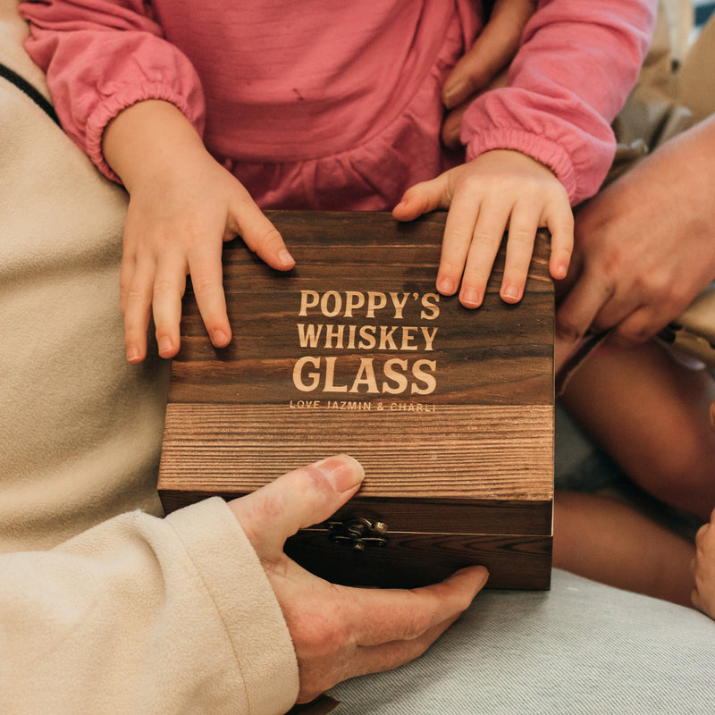 Whiskey gift set with gift wrapping, ribbon, and complimentary card