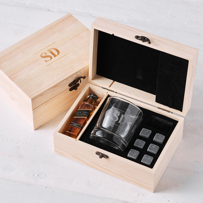 Premium personalised whiskey lover’s gift with stones, mini bottle, and wooden keepsake box.