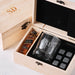 Engraved wooden whiskey gift set featuring custom scotch glass and accessories for him.