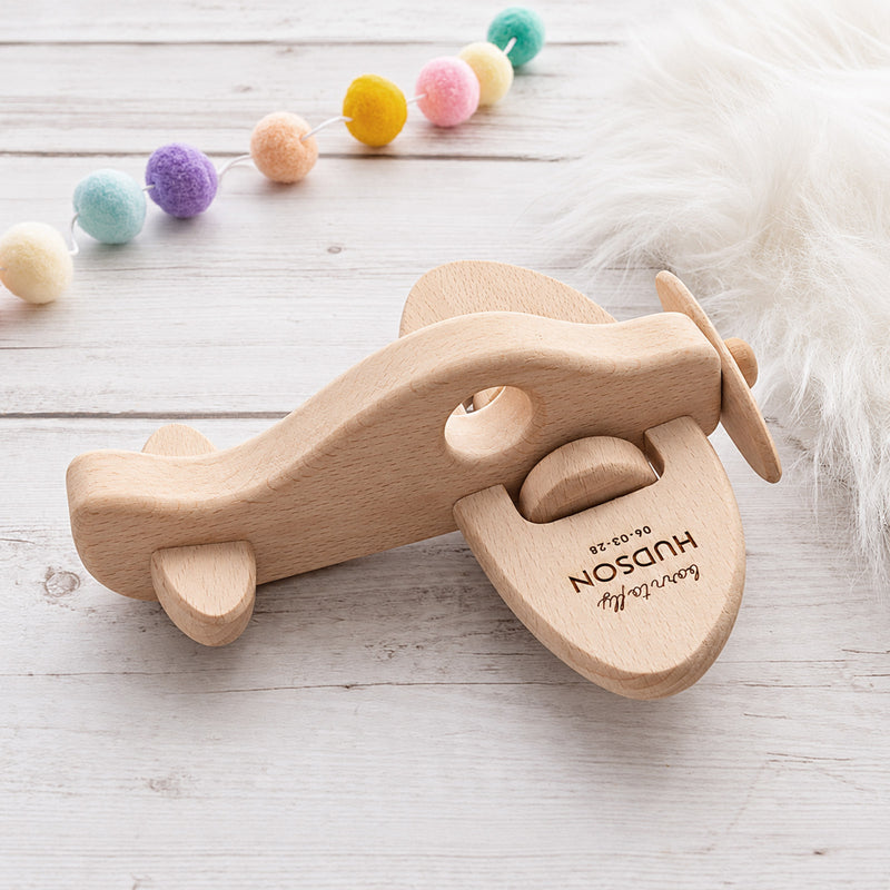 Personalised wooden aeroplane toy engraved with child’s name in premium beech wood